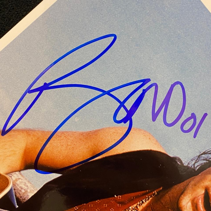 Фото с автографом музыканта Боно, участника группы U2